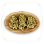 Load image into Gallery viewer, Amnesia Hypro CBD flower in wooden bowl with white background
